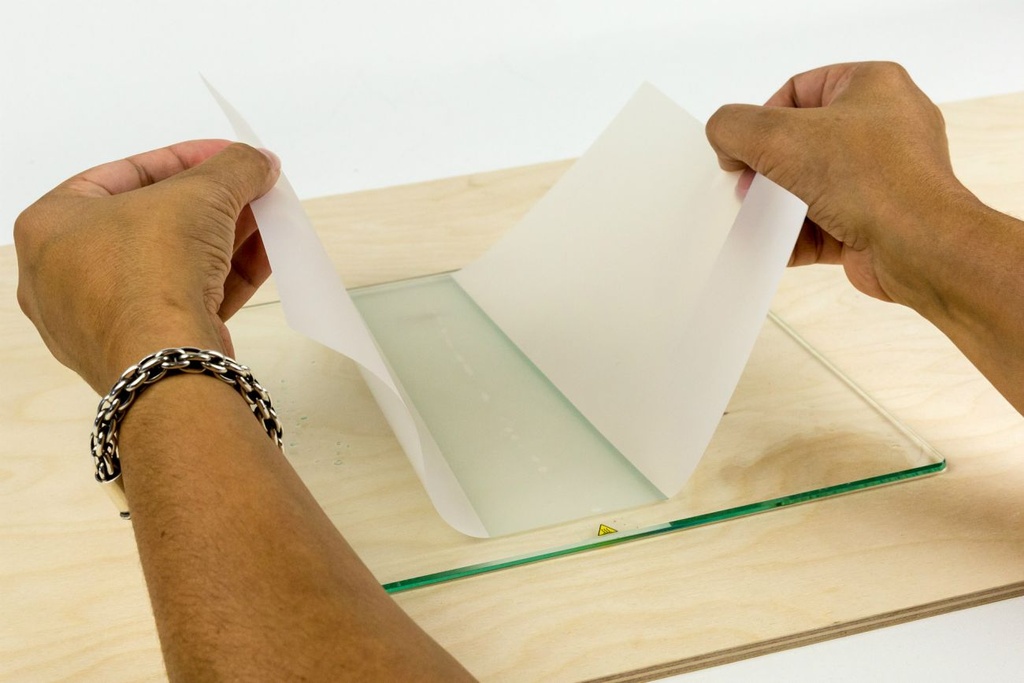 Applying-the-adhesion-sheet.jpg